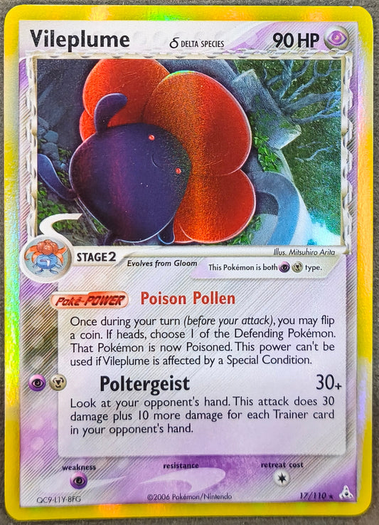 A holographic Pokémon trading card of Vileplume, featuring a yellow border and colorful artwork of purple and orange flowers, placed on a gray textured surface.